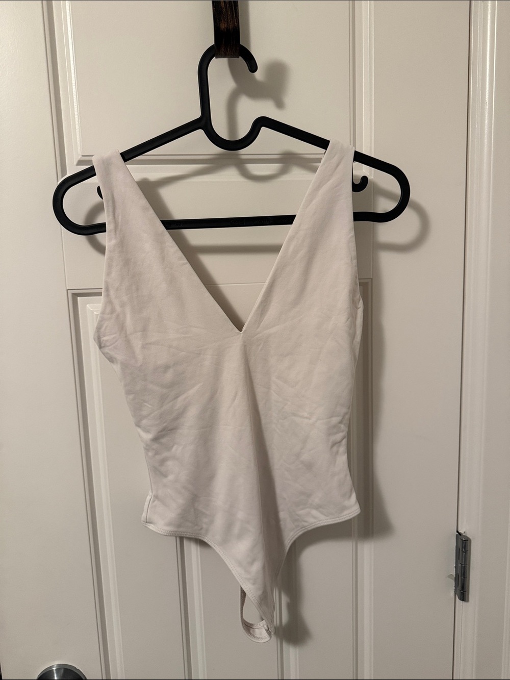 Babaton White Deep V Sleeveless Bodysuit